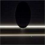 Astronomy Picture of the Day: Enceladus in Silhouette