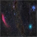 Astronomy Picture of the Day: Red Nebula, Green Comet, Blue Stars